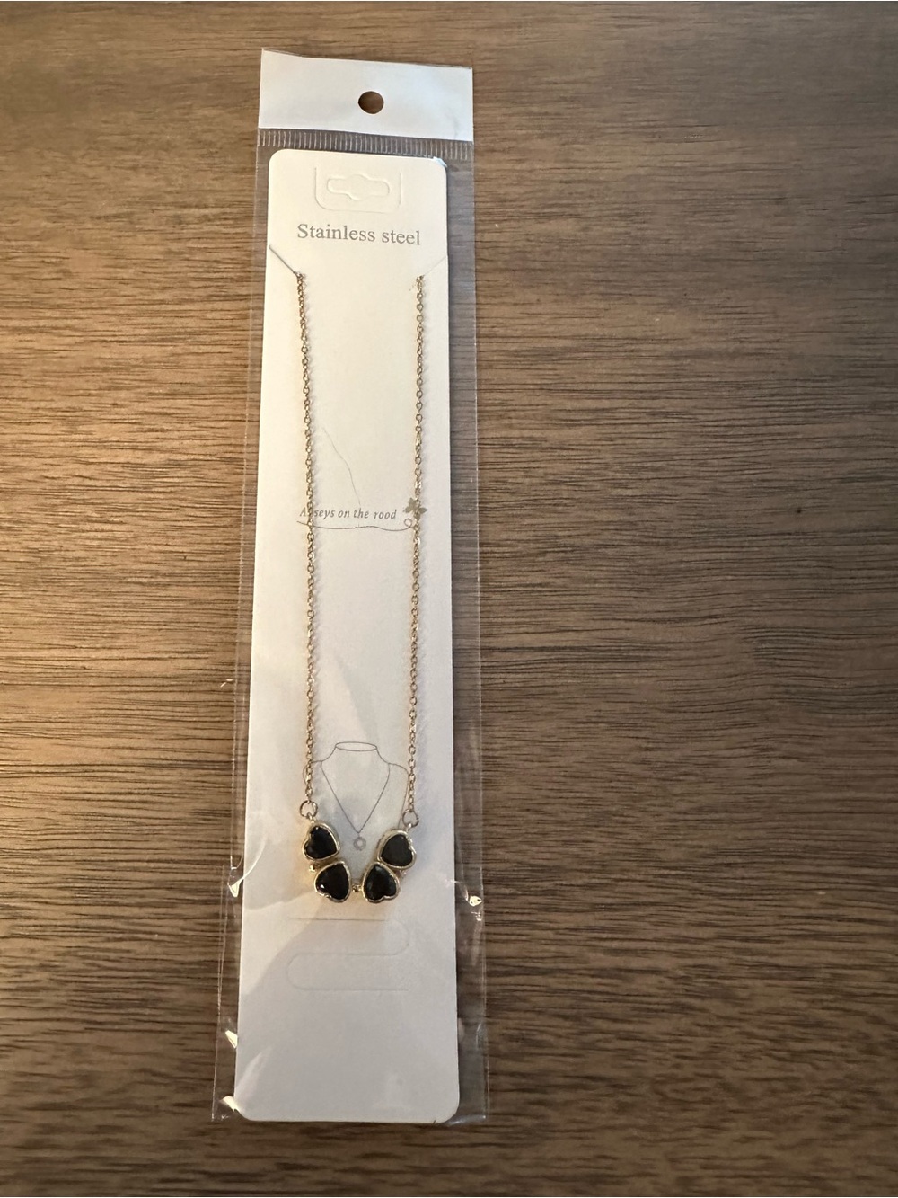 Stainless Steel Gold-Tone Necklace with Black Heart Charms